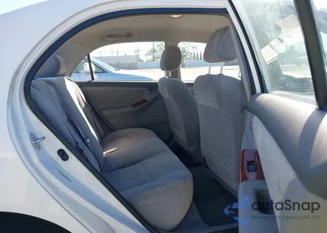 2003 Toyota Corolla Le z USA, uszkodzony, nr VIN JTDBR32E630013221